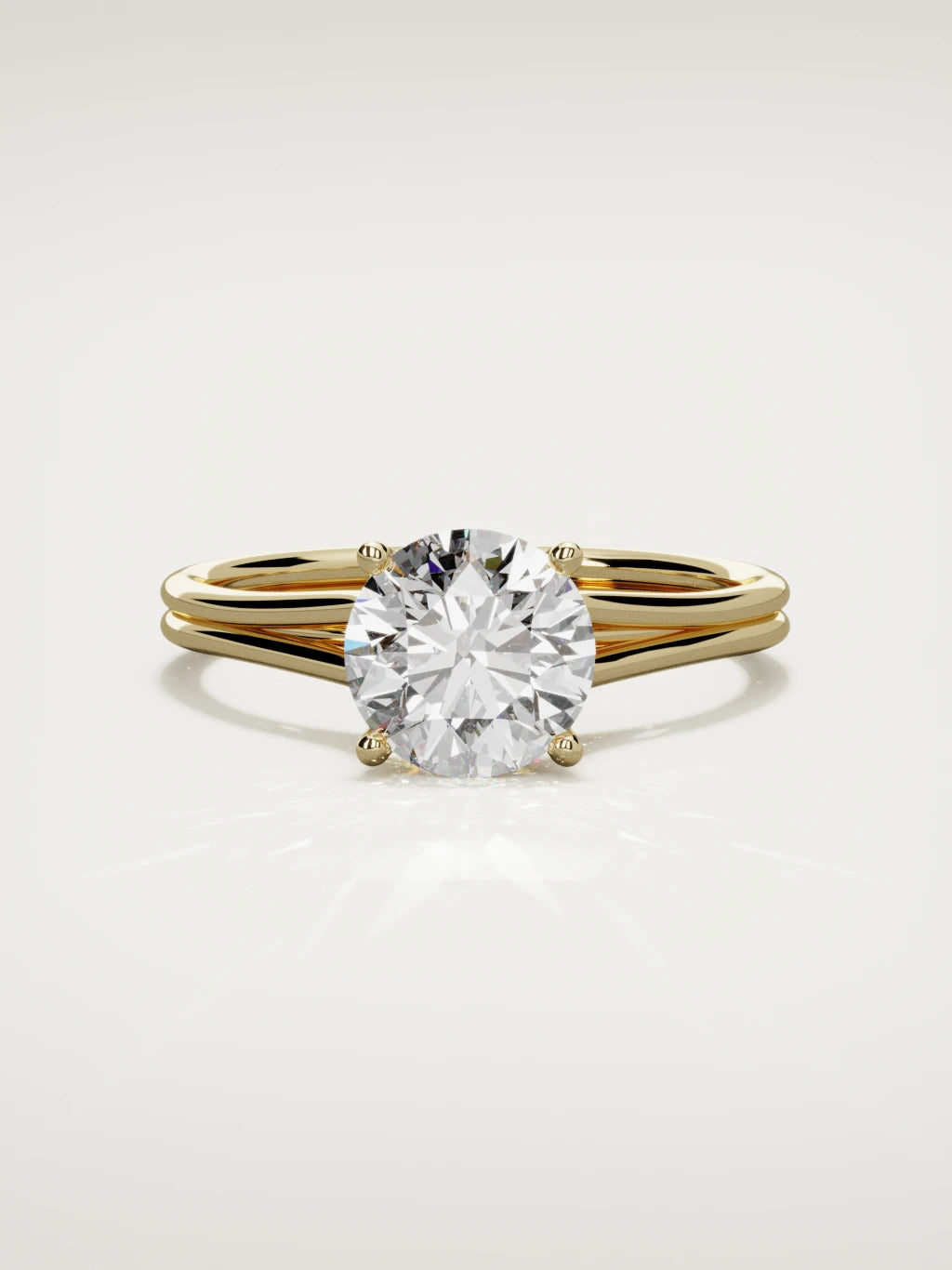 The Duo round lab-grown diamond solitaire in 14K yellow gold, front view