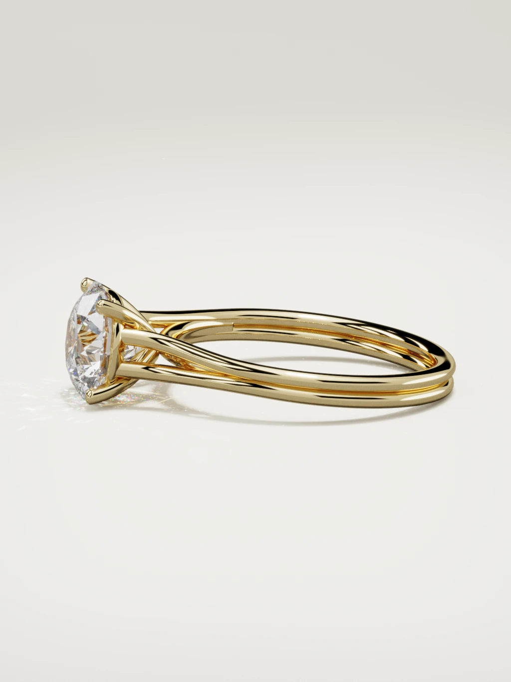 The Duo round lab-grown diamond solitaire in 14K yellow gold, side view