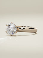 The Fina round lab-grown diamond solitaire in 14K rose gold, three-quarter view