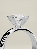 The Fina round lab-grown diamond solitaire in 14K white gold, standing three-quarter view