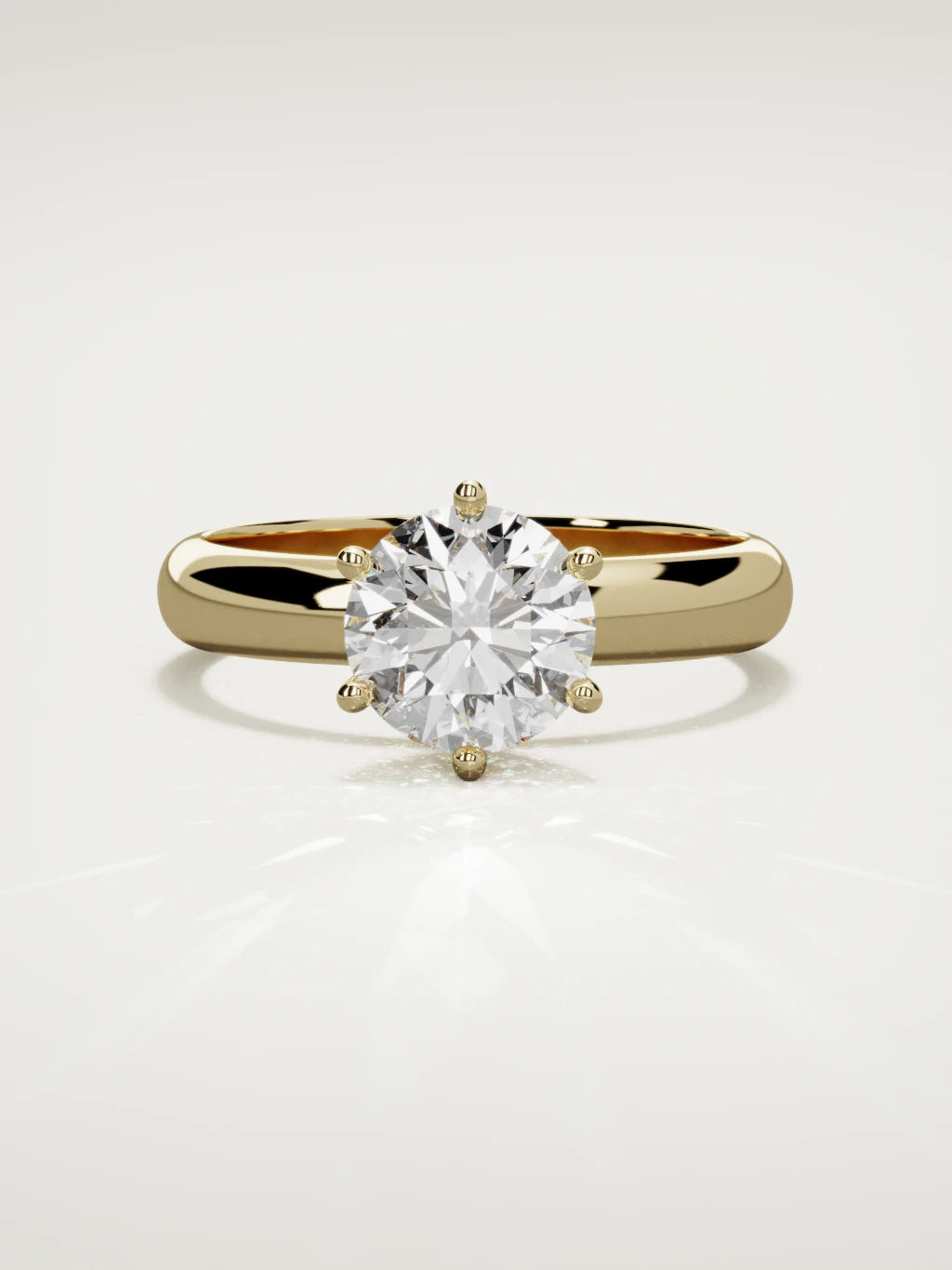 The Fina round lab-grown diamond solitaire in 14K yellow gold, front view