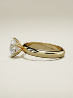 The Fina round lab-grown diamond solitaire in 14K yellow gold, side view