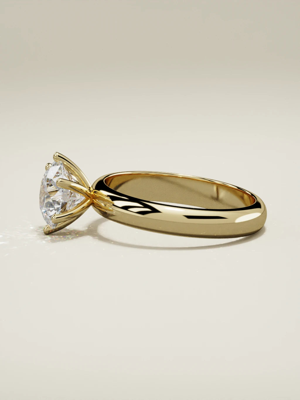 The Fina round lab-grown diamond solitaire in 14K yellow gold, side view