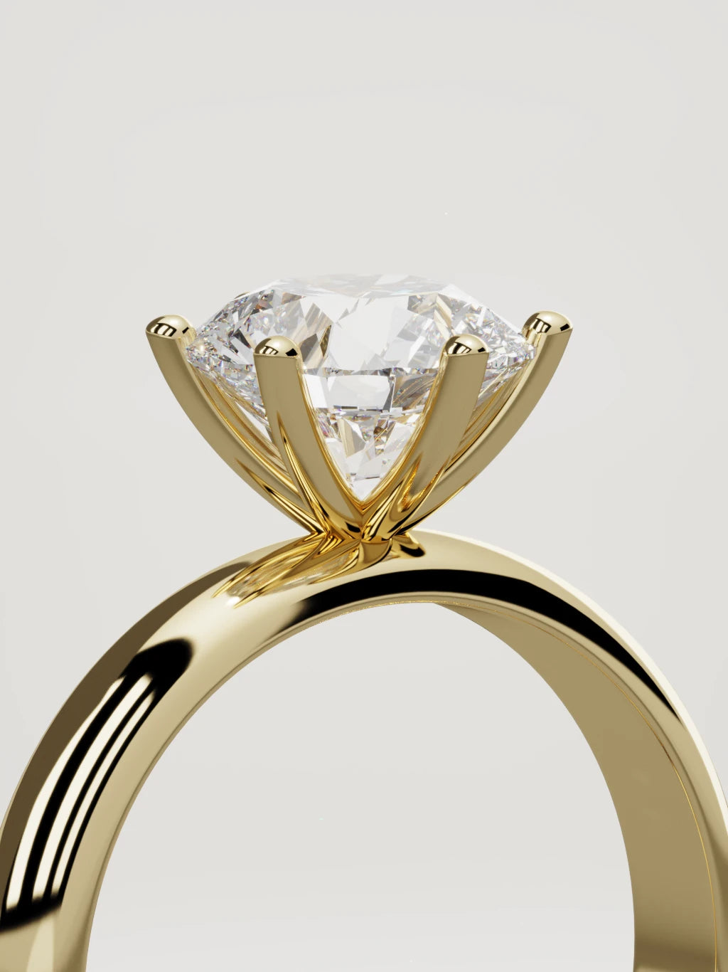 The Fina round lab-grown diamond solitaire in 14K yellow gold, standing three-quarter view