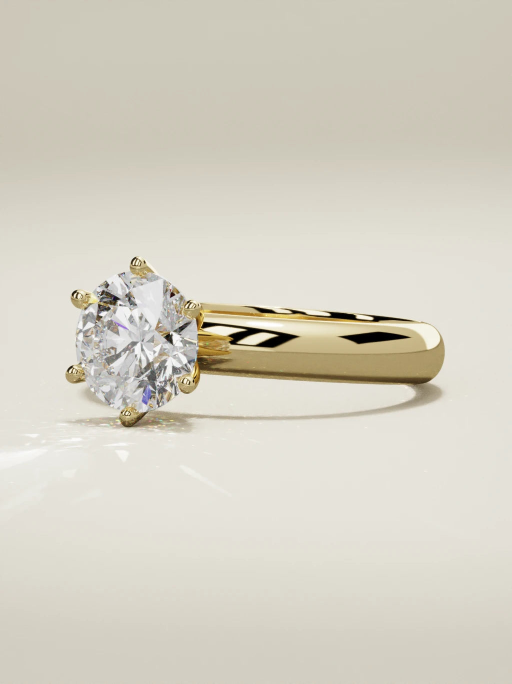 The Fina round lab-grown diamond solitaire in 14K yellow gold, three-quarter view