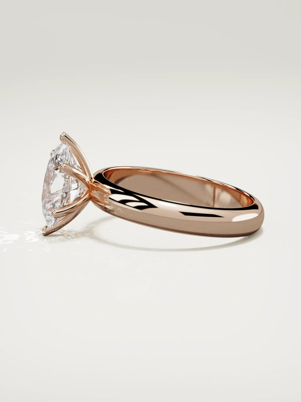 The Fina oval lab-grown diamond solitaire in 14K rose gold, side view