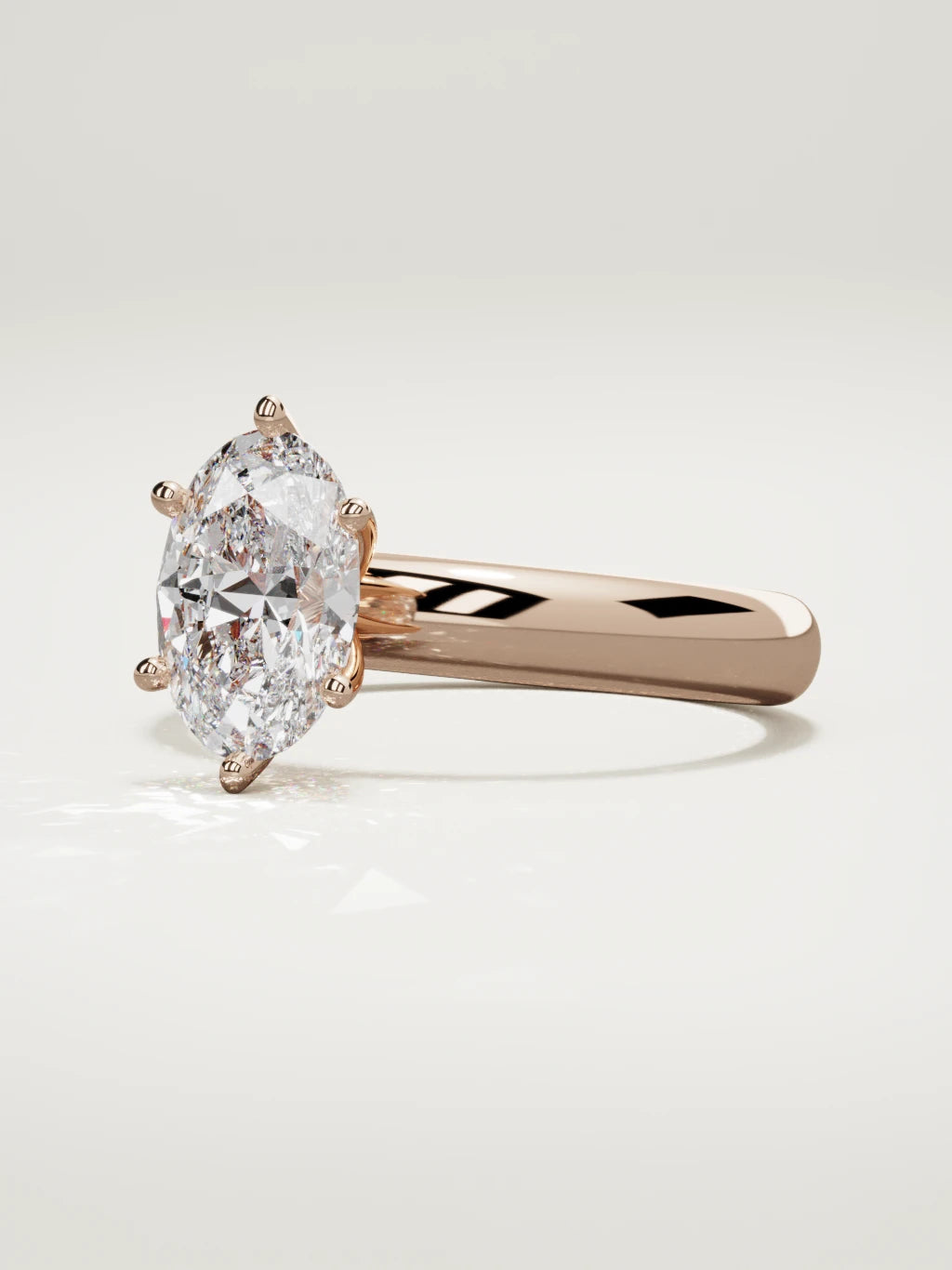 The Fina oval lab-grown diamond solitaire in 14K rose gold, three-quarter view