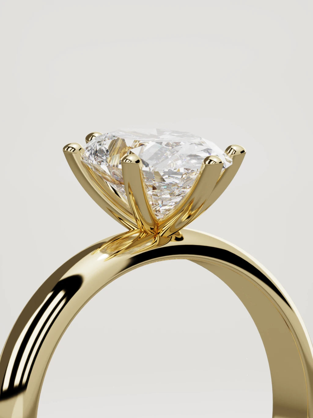 The Fina oval lab-grown diamond solitaire in 14K yellow gold, standing three-quarter view
