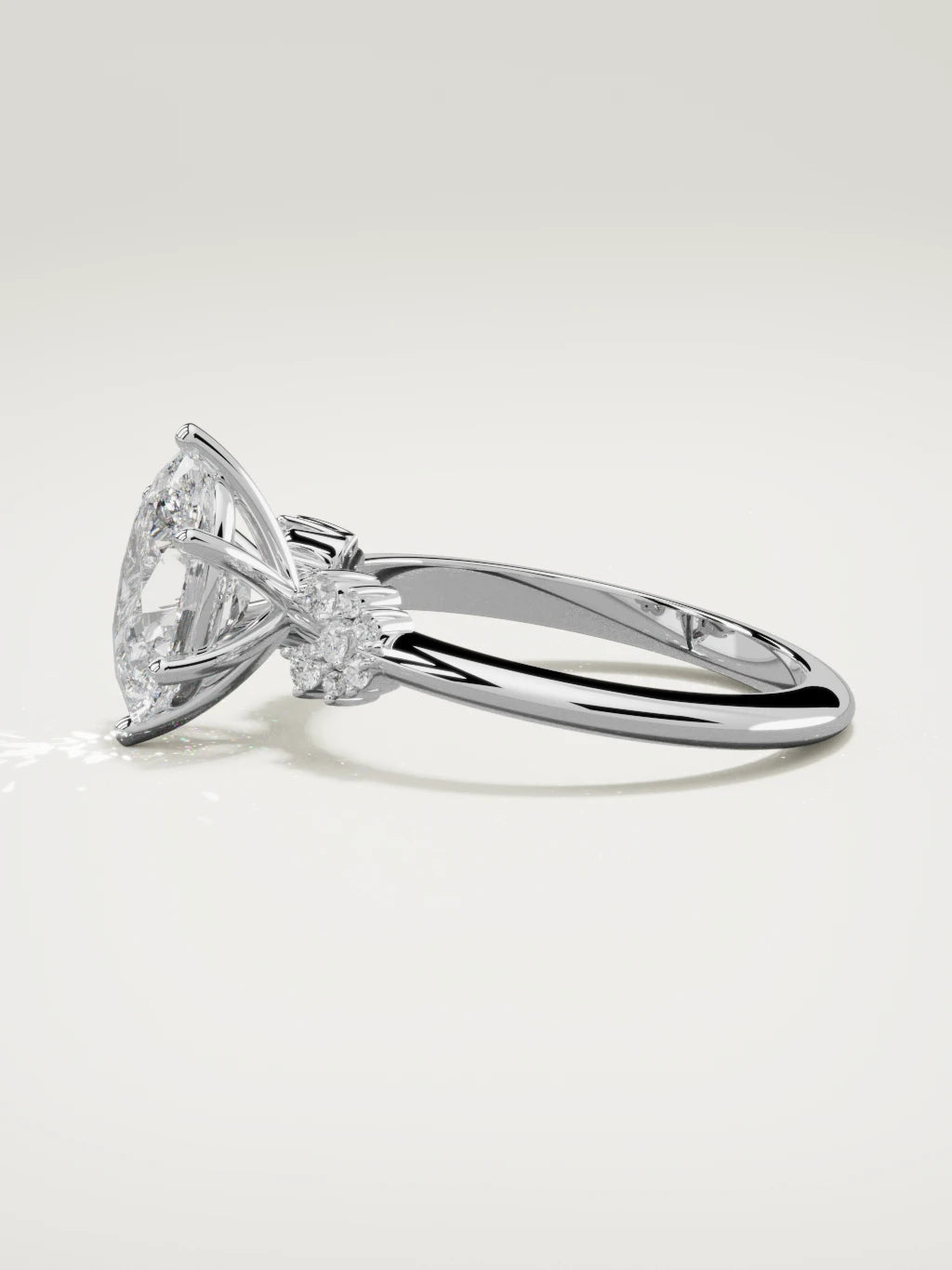 The Flora oval lab-grown diamond solitaire in 14K white gold, side view