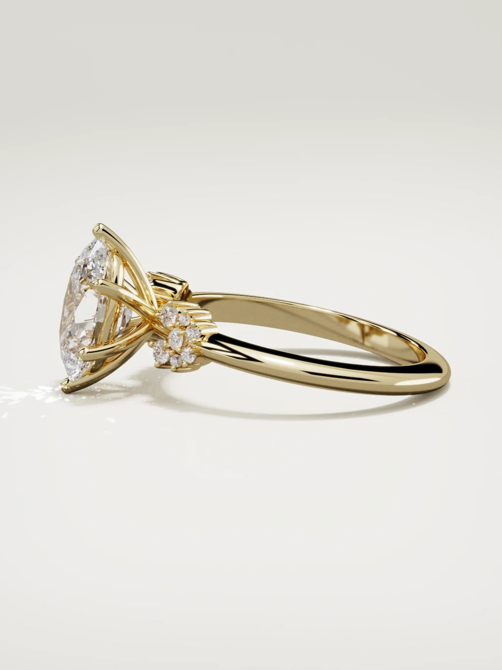 The Flora oval lab-grown diamond solitaire in 14K yellow gold, side view