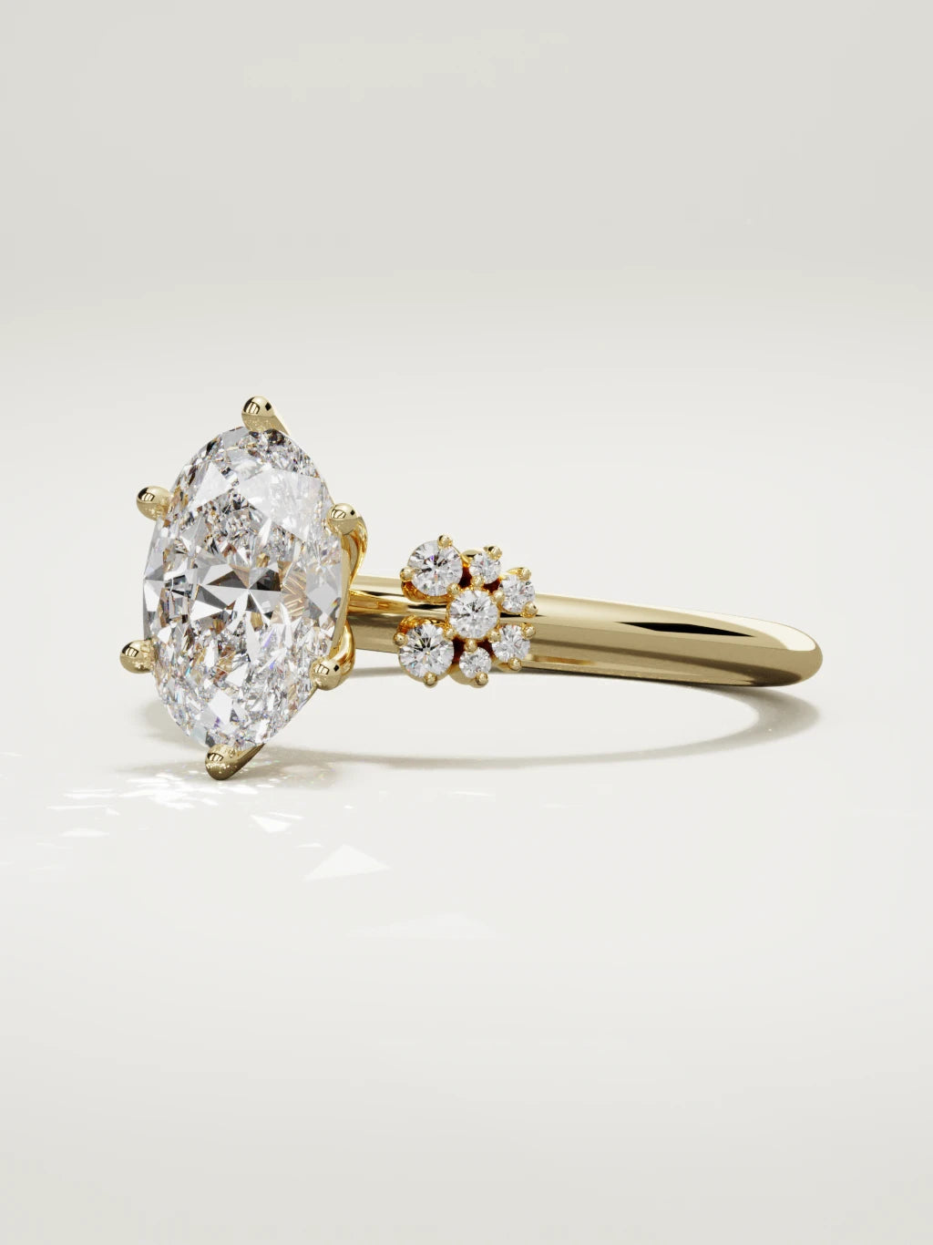 The Flora oval lab-grown diamond solitaire in 14K yellow gold, three-quarter view
