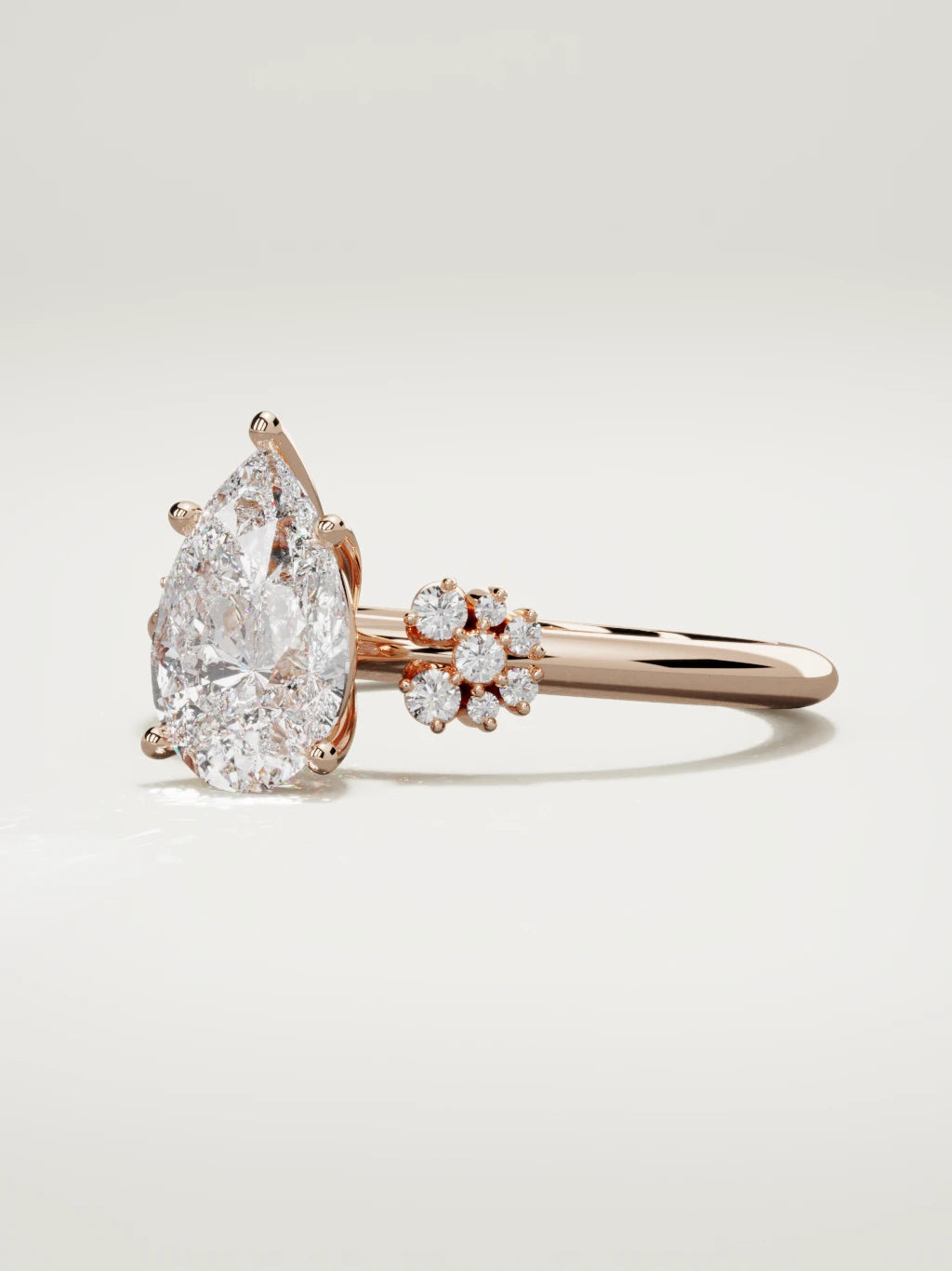 The Flora pear-shaped lab-grown diamond solitaire in 14K rose gold, three-quarter view