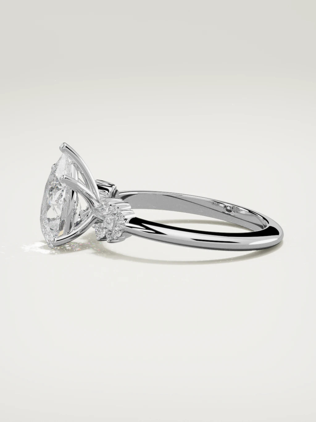 The Flora pear-shaped lab-grown diamond solitaire in 14K white gold, side view