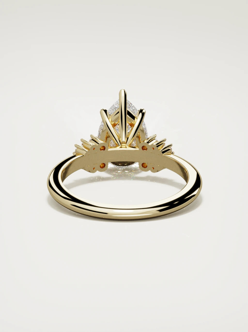 The Flora pear-shaped lab-grown diamond solitaire in 14K yellow gold, back view