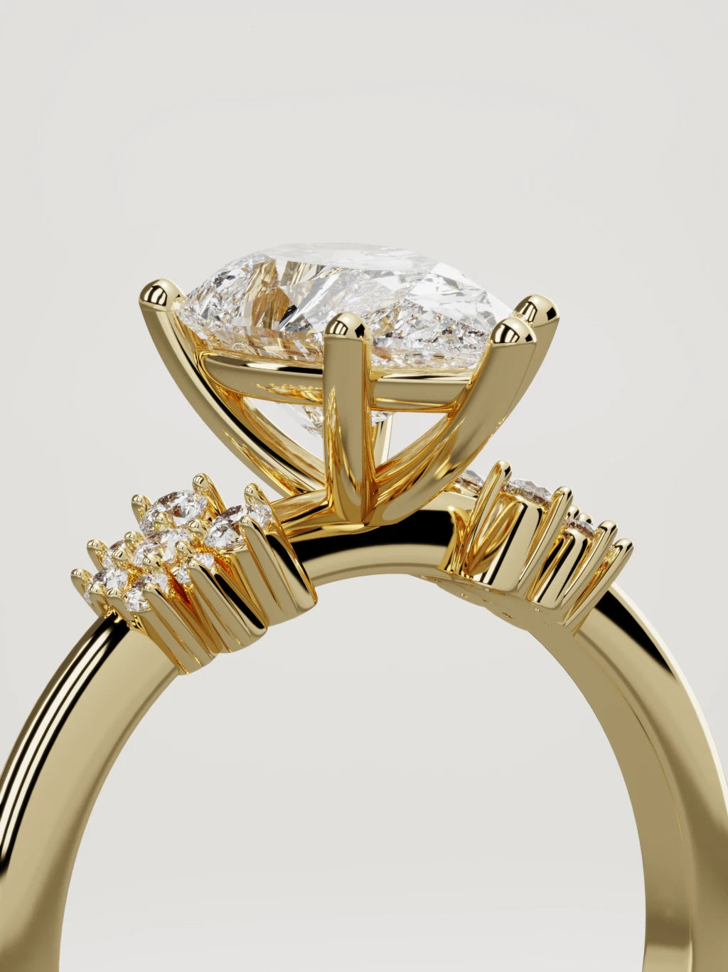 The Flora pear-shaped lab-grown diamond solitaire in 14K yellow gold, standing three-quarter view