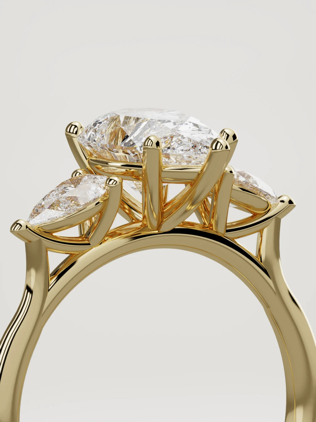 The Gala pear-shaped lab-grown diamond ring in 14K yellow gold, standing three-quarter view