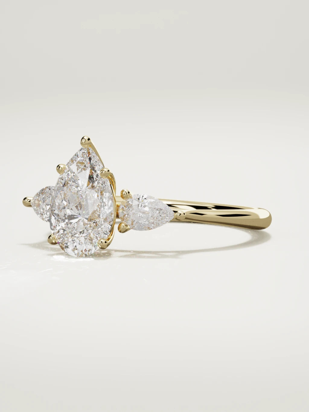 The Gala pear-shaped lab-grown diamond ring in 14K yellow gold, three-quarter view
