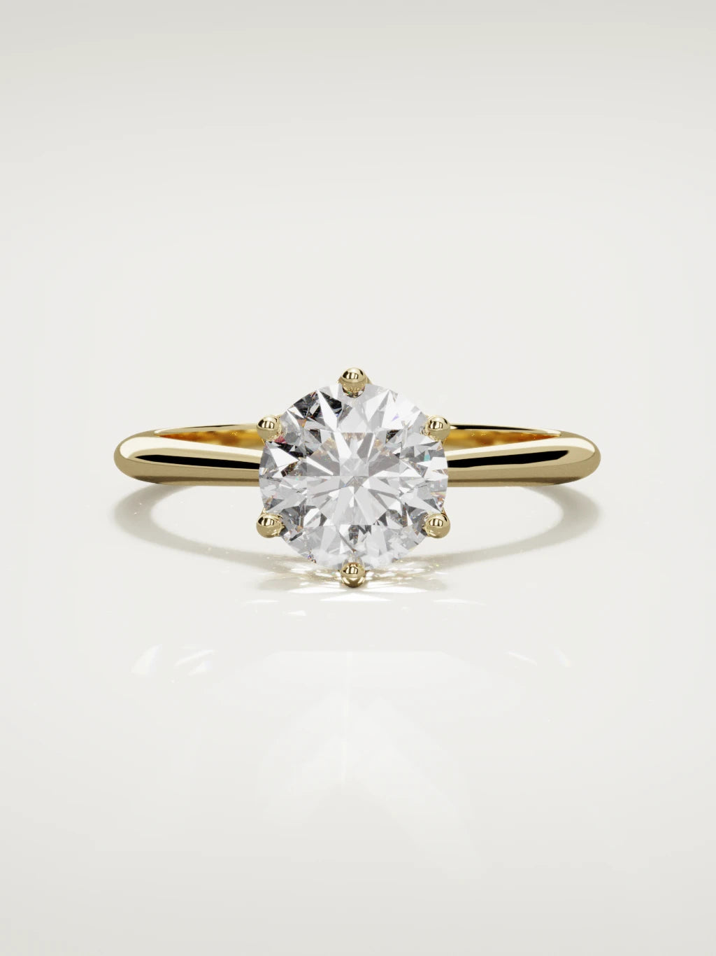 The Iris round lab-grown diamond solitaire in 14K yellow gold, front view