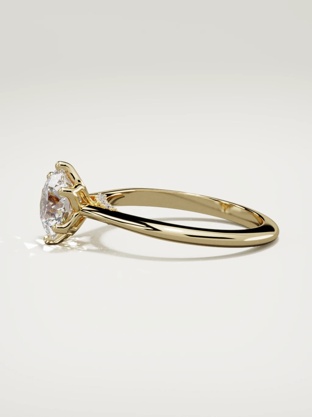 The Iris round lab-grown diamond solitaire in 14K yellow gold, side view