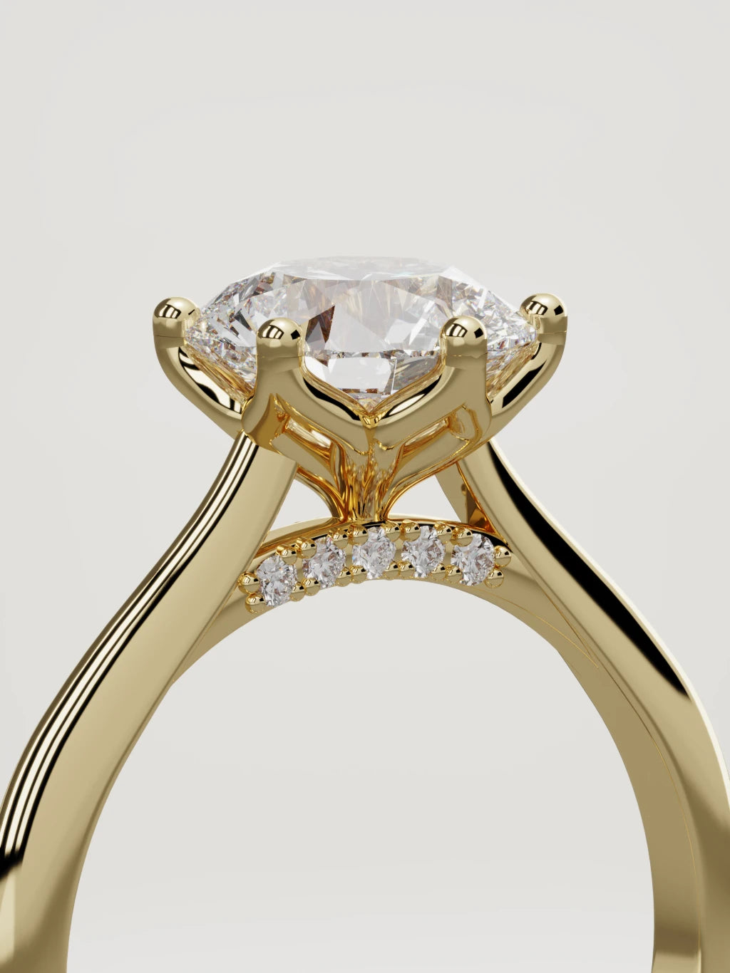 The Iris round lab-grown diamond solitaire in 14K yellow gold, standing three-quarter view