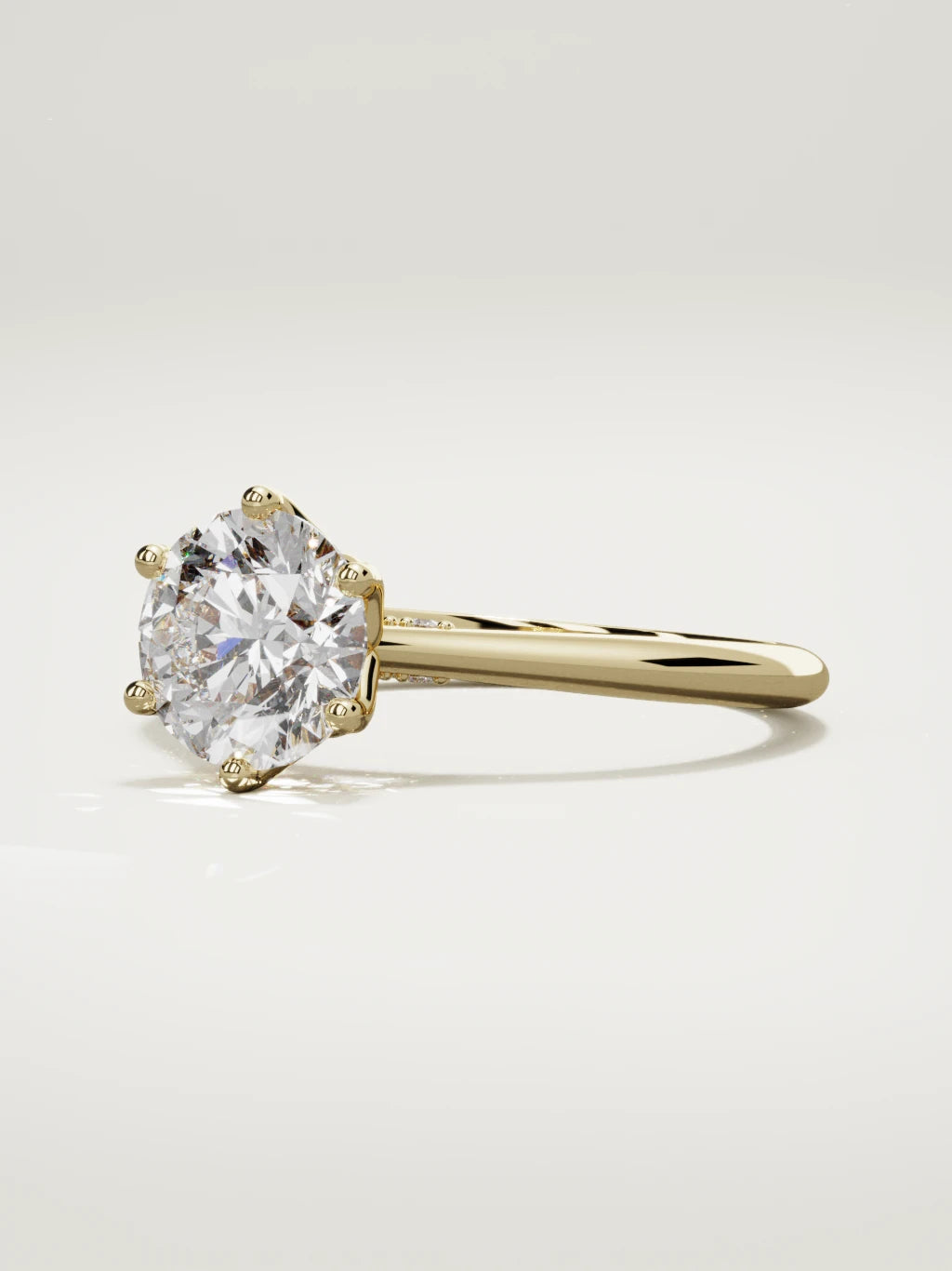 The Iris round lab-grown diamond solitaire in 14K yellow gold, three-quarter view