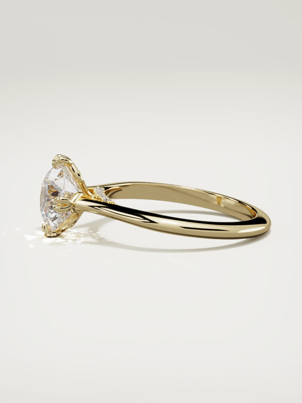 The Jazmin round lab-grown diamond solitaire in 14K yellow gold, side view