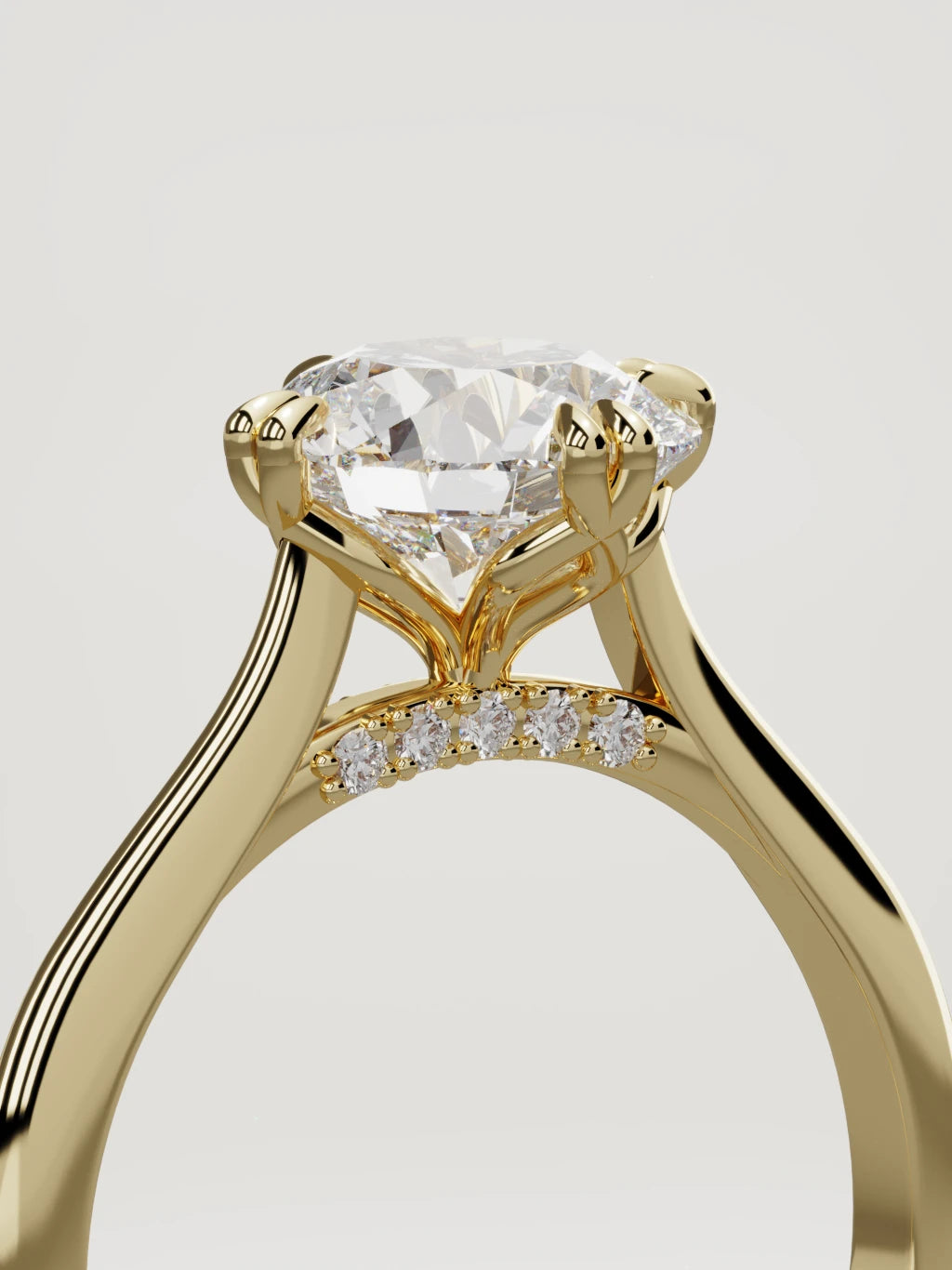 The Jazmin round lab-grown diamond solitaire in 14K yellow gold, standing three-quarter view