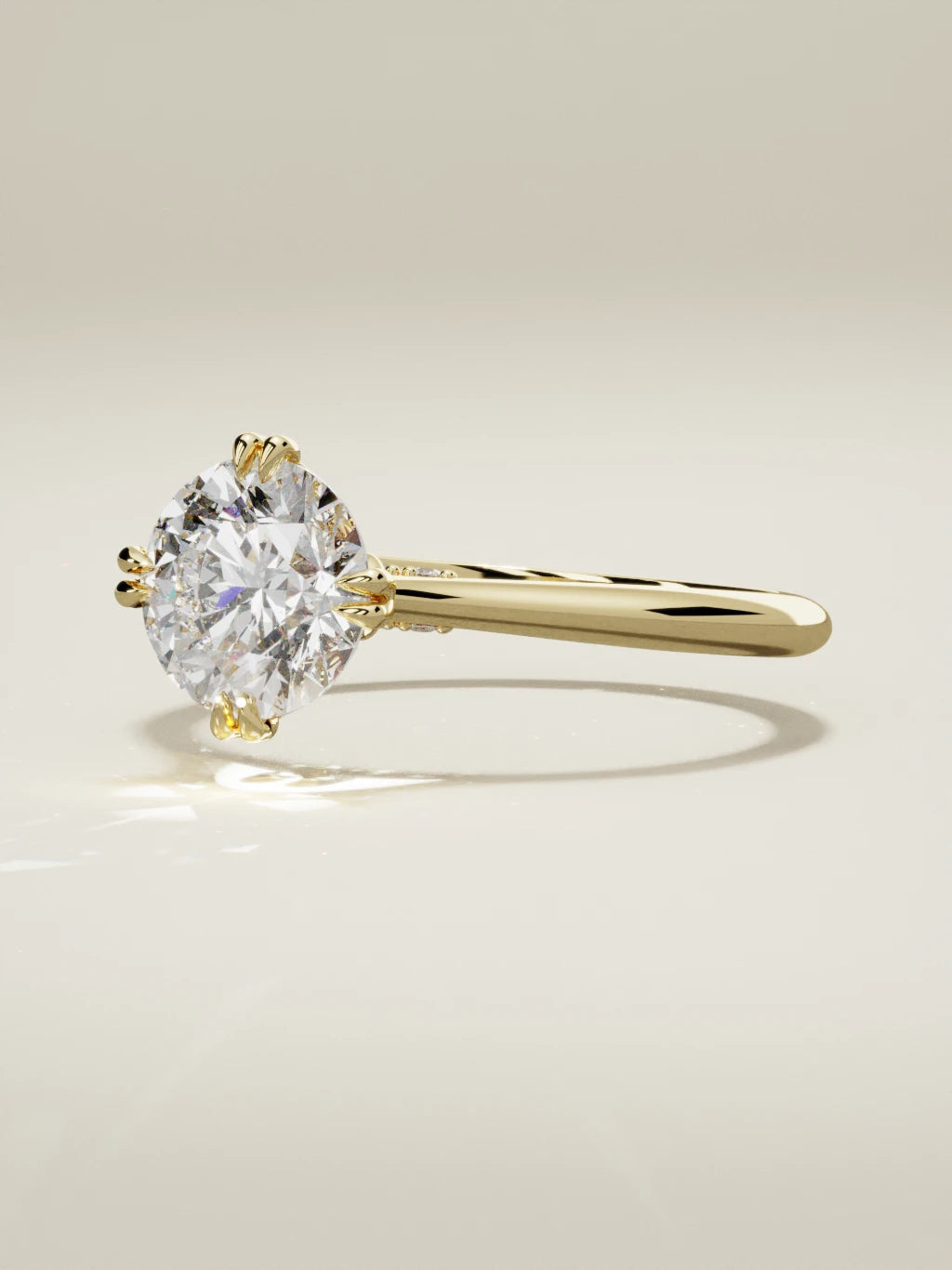 The Jazmin round lab-grown diamond solitaire in 14K yellow gold, three-quarter view