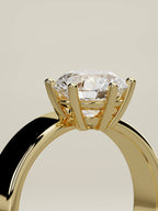 The Joya round lab-grown diamond solitaire in 14K yellow gold, standing three-quarter view