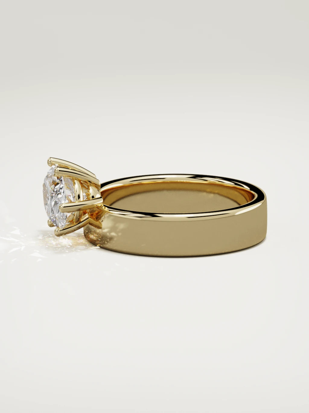 The Joya east-west oval lab-grown diamond solitaire in 14K yellow gold, side view