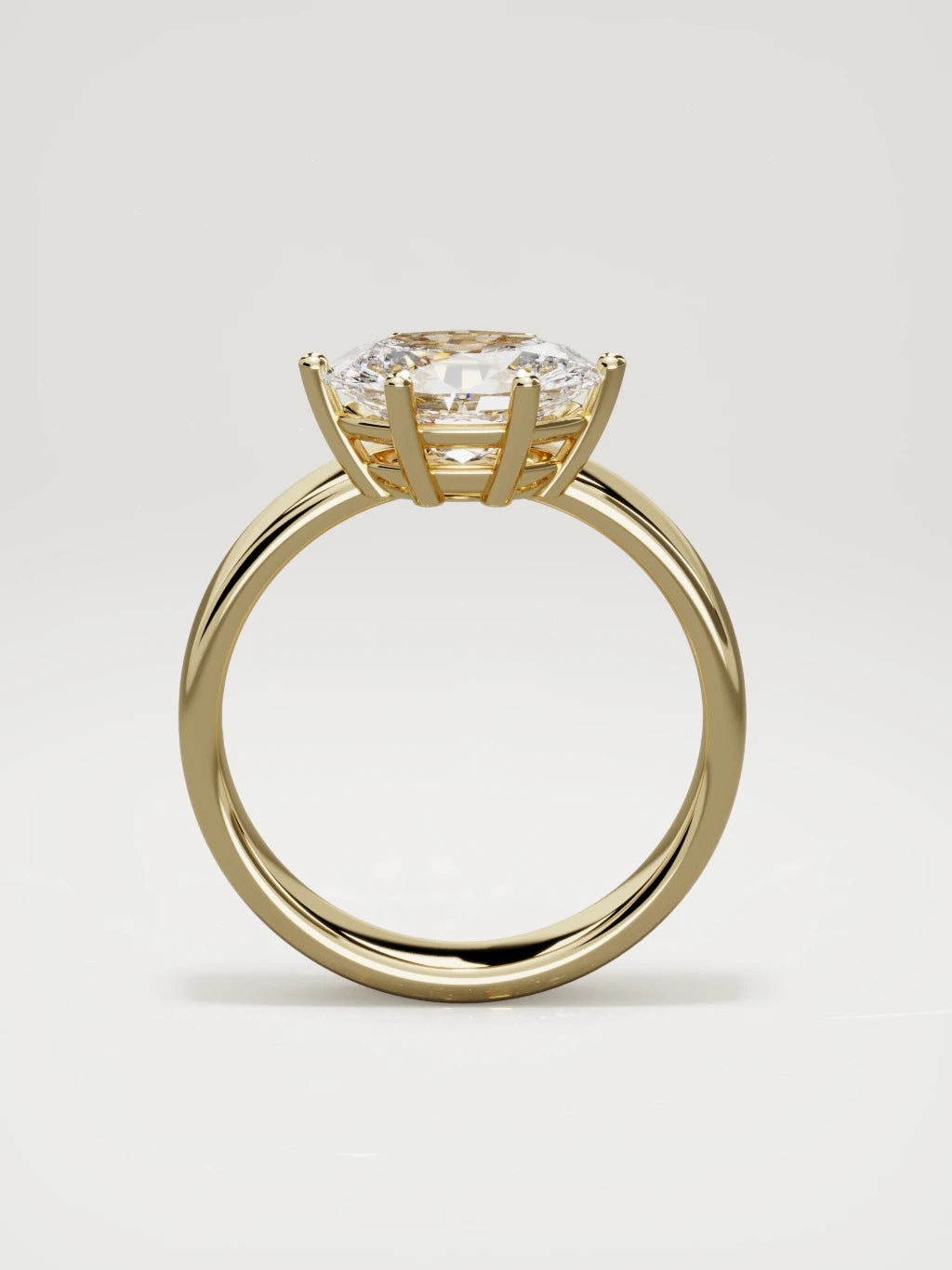 The Joya east-west oval lab-grown diamond solitaire in 14K yellow gold, standing front view