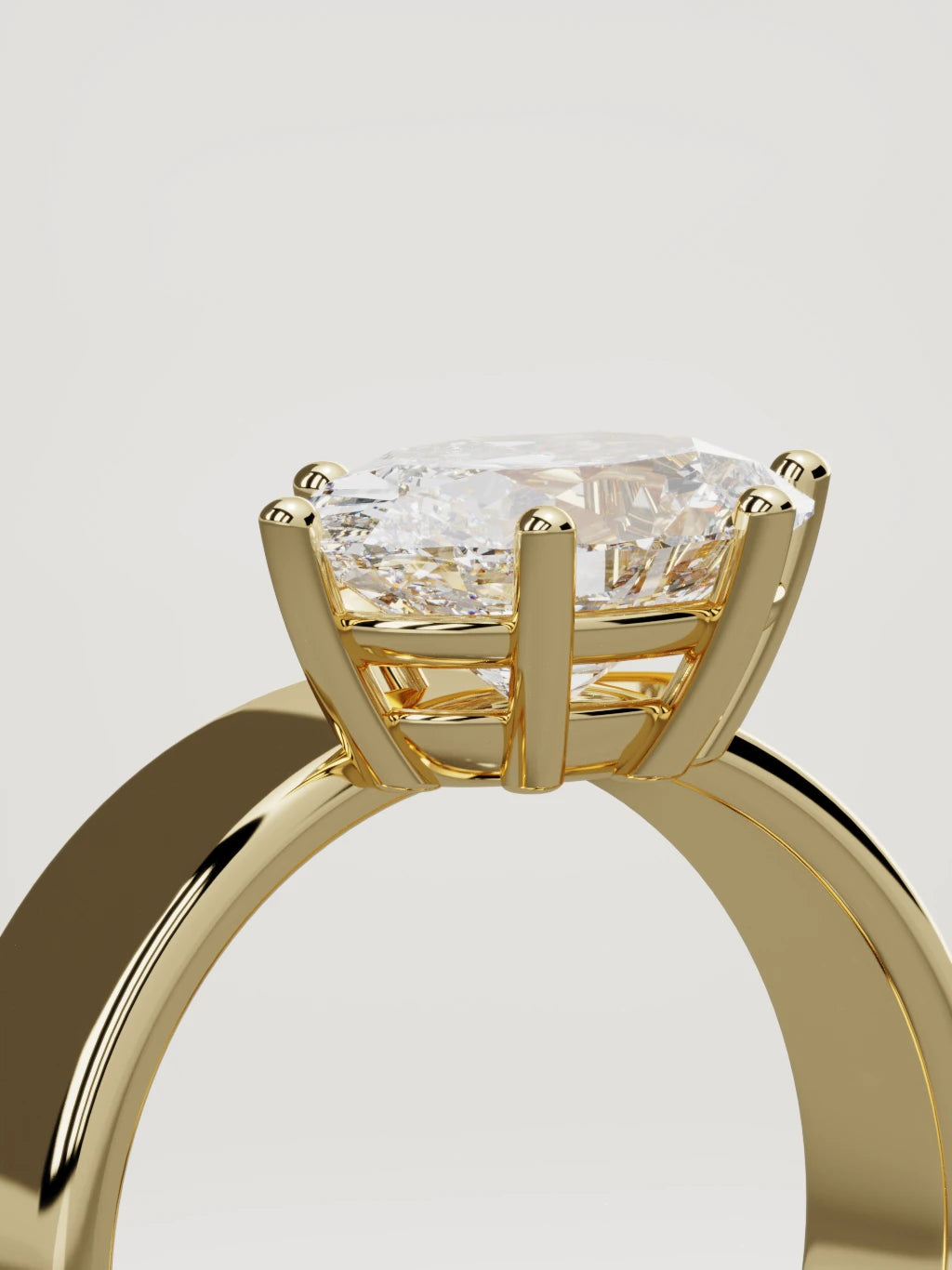 The Joya east-west oval lab-grown diamond solitaire in 14K yellow gold, standing three-quarter view