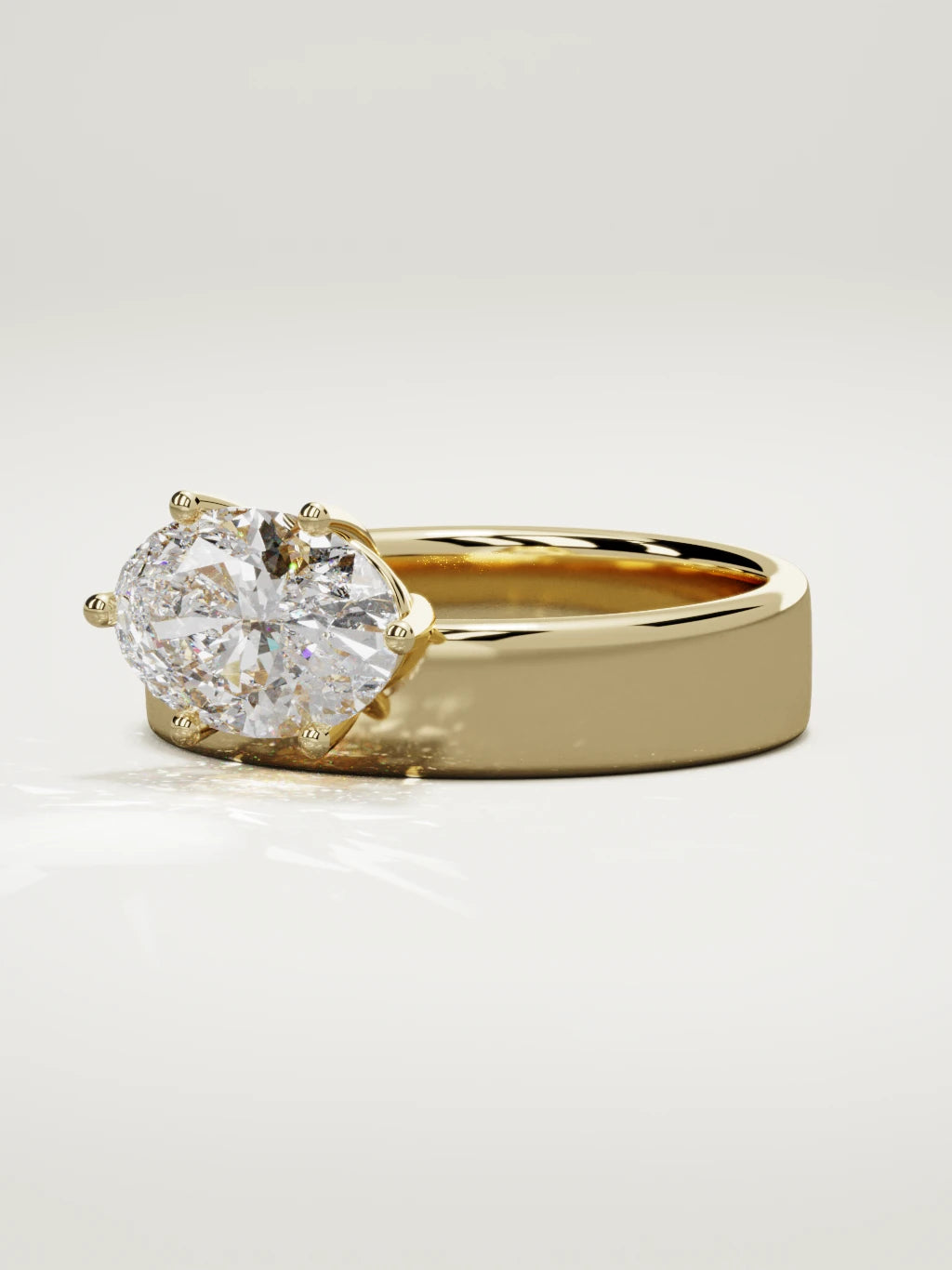 The Joya east-west oval lab-grown diamond solitaire in 14K yellow gold, three-quarter view