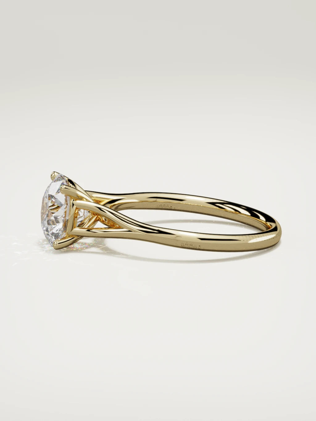 The Lazo round lab-grown diamond solitaire in 14K yellow gold, side view