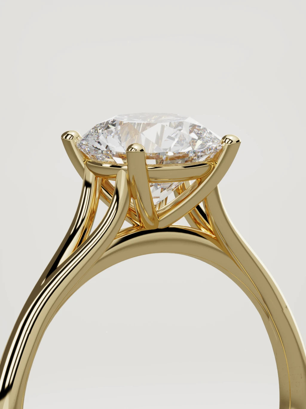 The Lazo round lab-grown diamond solitaire in 14K yellow gold, standing three-quarter view