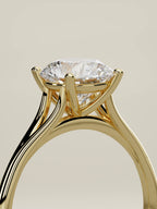 The Lazo round lab-grown diamond solitaire in 14K yellow gold, standing three-quarter view