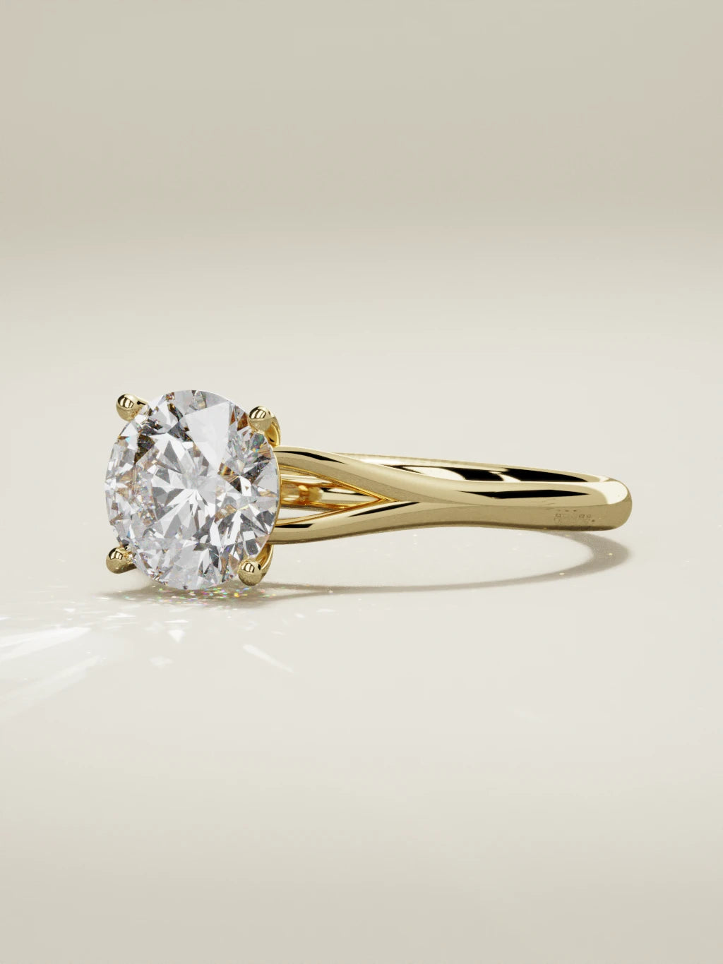 The Lazo round lab-grown diamond solitaire in 14K yellow gold, three-quarter view