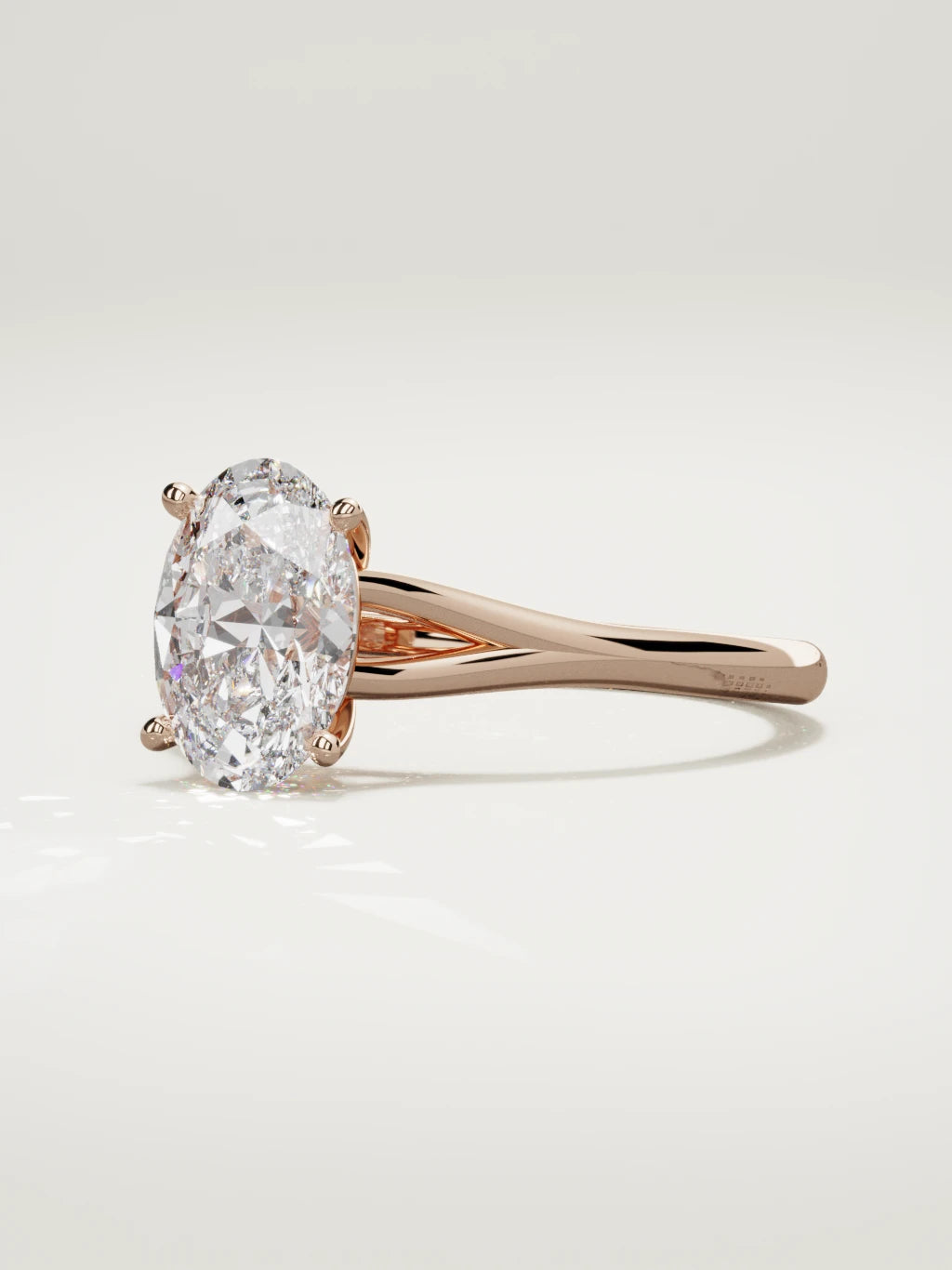 The Lazo oval lab-grown diamond solitaire in 14K rose gold, three-quarter view
