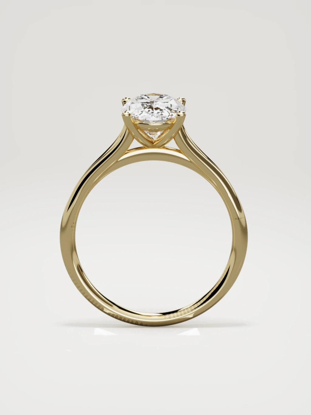 The Lazo oval lab-grown diamond solitaire in 14K yellow gold, standing front view