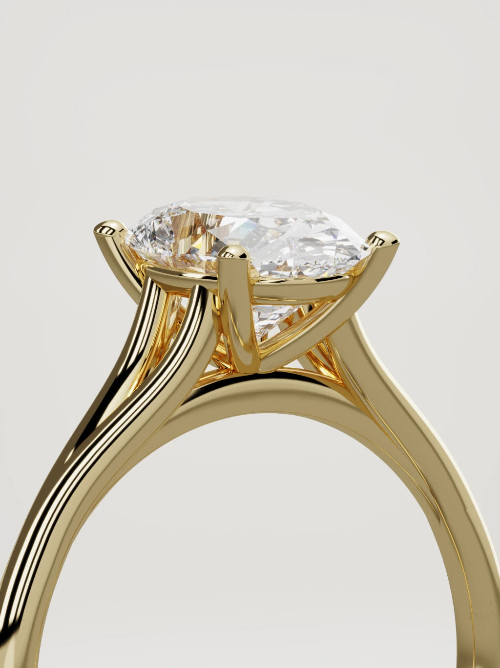 The Lazo oval lab-grown diamond solitaire in 14K yellow gold, standing three-quarter view