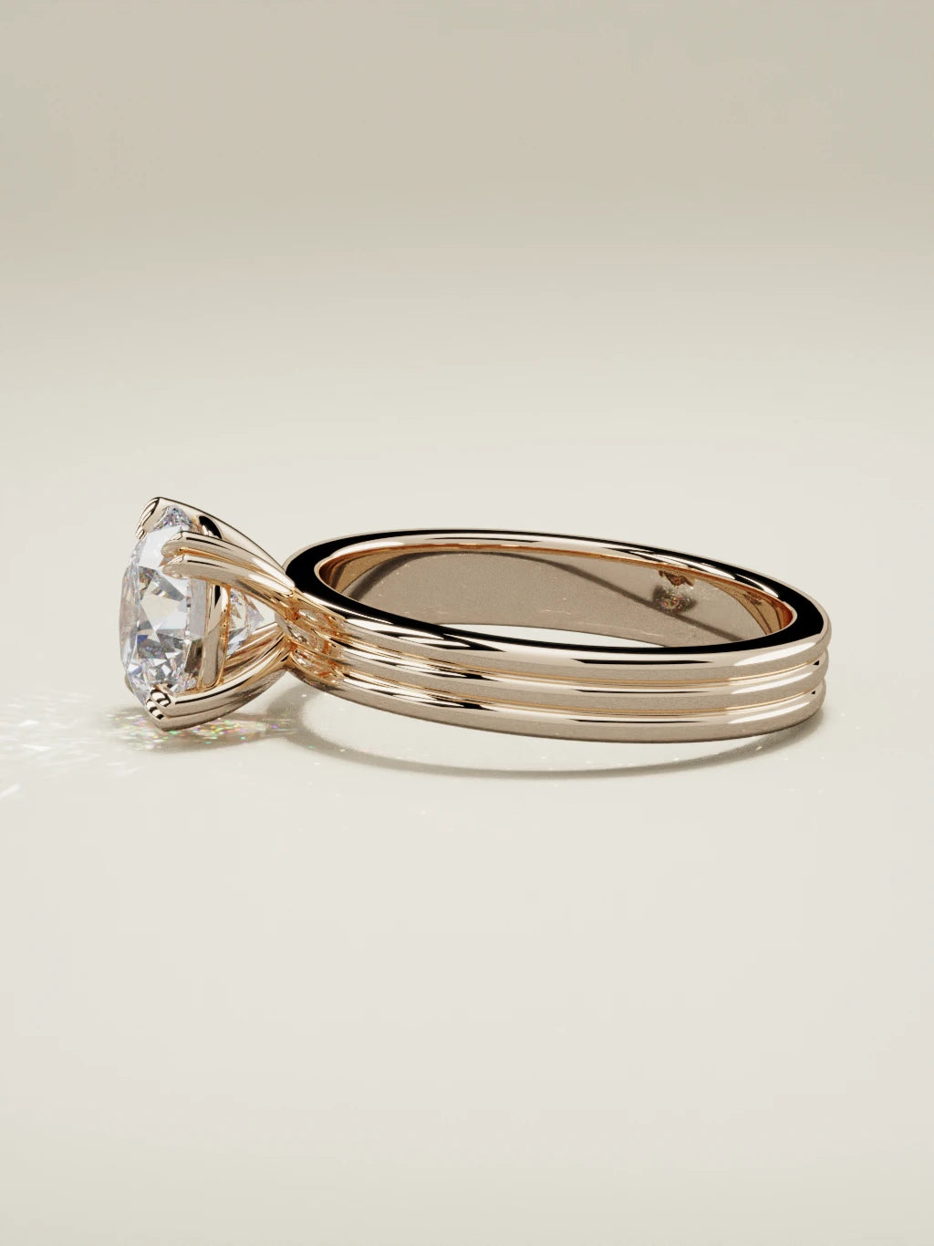The Lira round lab-grown diamond solitaire in 14K rose gold, side view