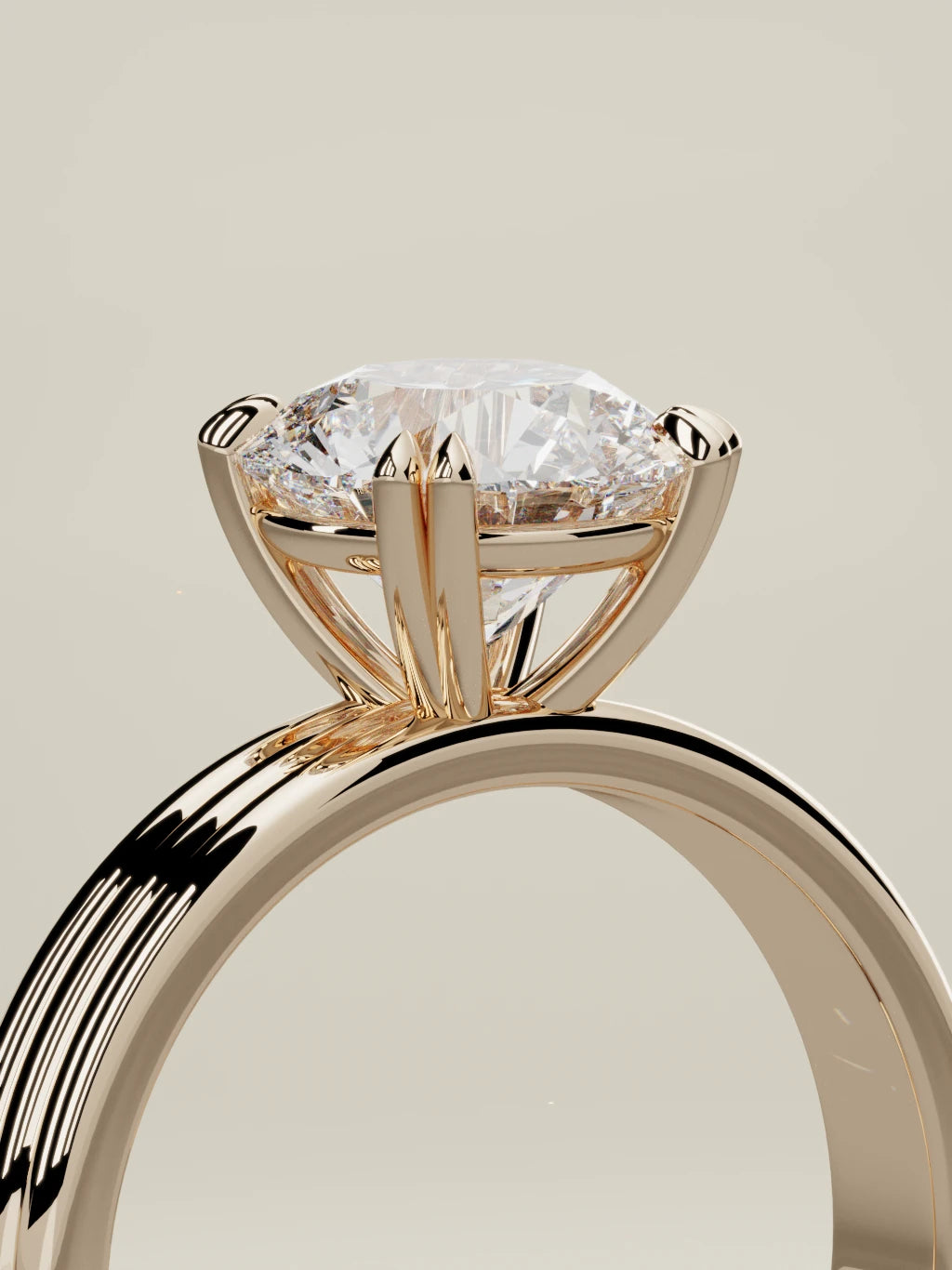 The Lira round lab-grown diamond solitaire in 14K rose gold, standing three-quarter view