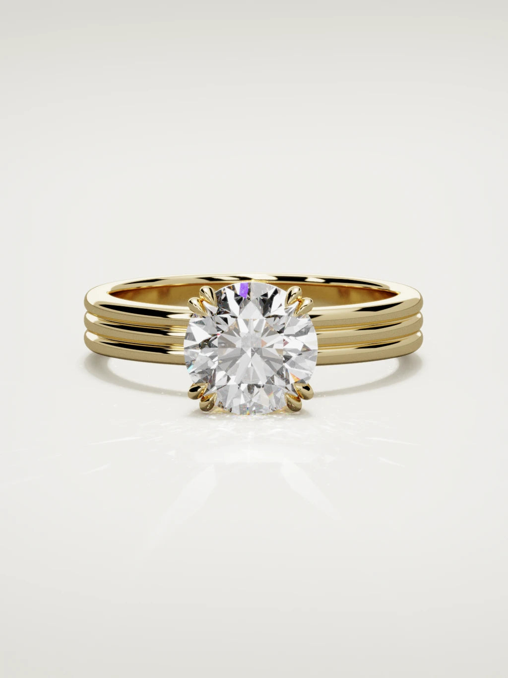 The Lira round lab-grown diamond solitaire in 14K yellow gold, front view
