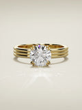 The Lira round lab-grown diamond solitaire in 14K yellow gold, front view