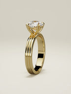 The Lira round lab-grown diamond solitaire in 14K yellow gold, standing front view
