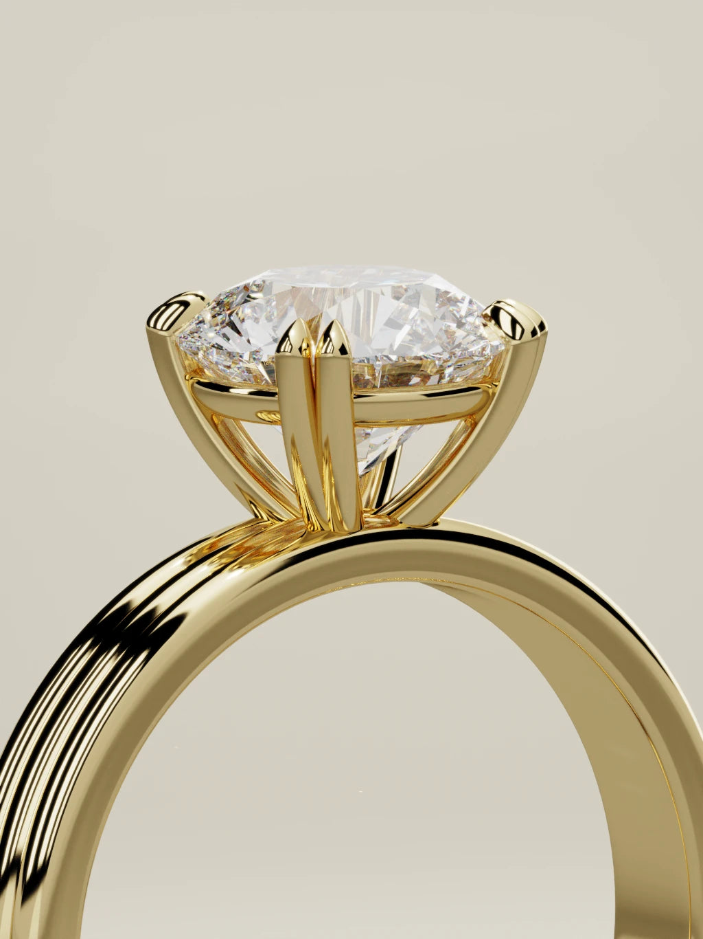 The Lira round lab-grown diamond solitaire in 14K yellow gold, standing three-quarter view