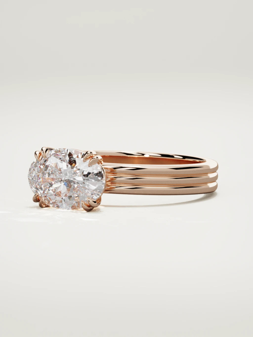 The Lira east-west oval lab-grown diamond solitaire in 14K rose gold, three-quarter view