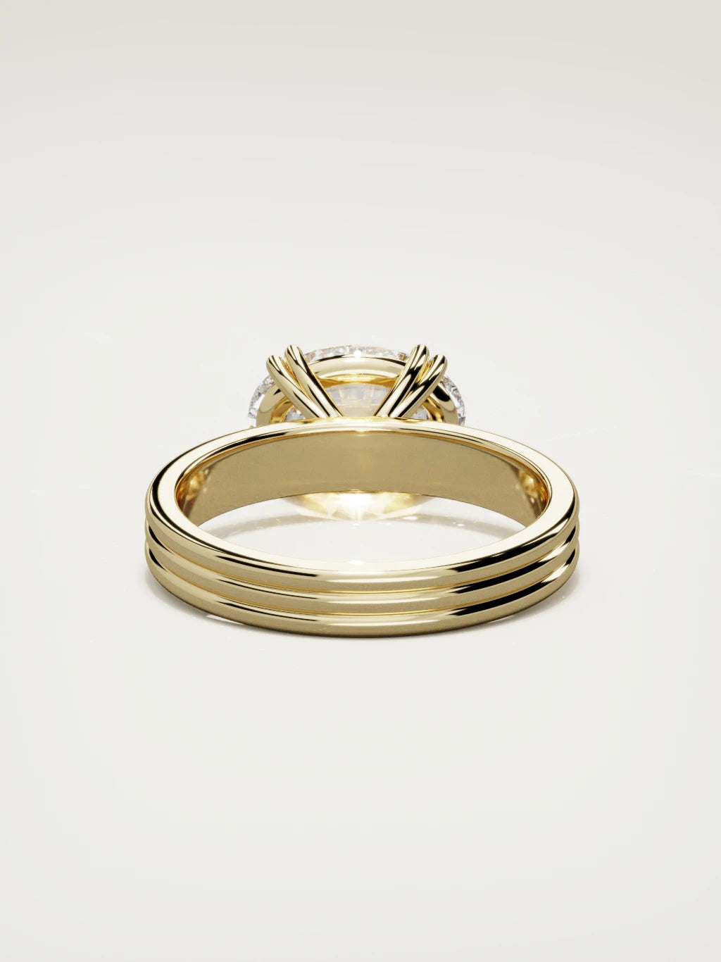 The Lira east-west oval lab-grown diamond solitaire in 14K yellow gold, back view
