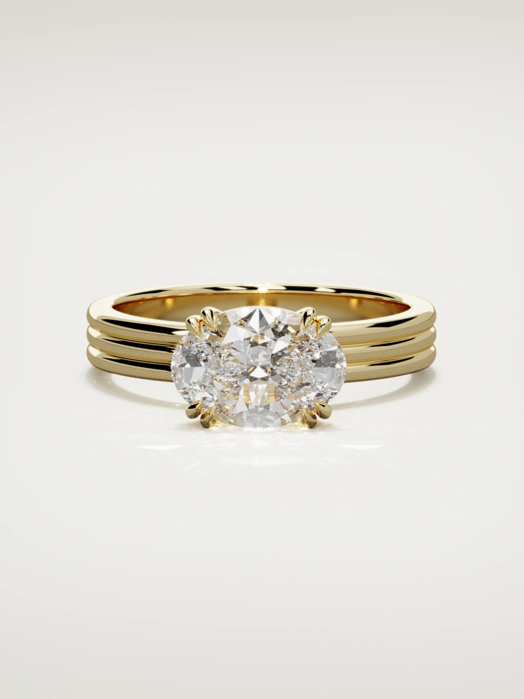 The Lira east-west oval lab-grown diamond solitaire in 14K yellow gold, front view