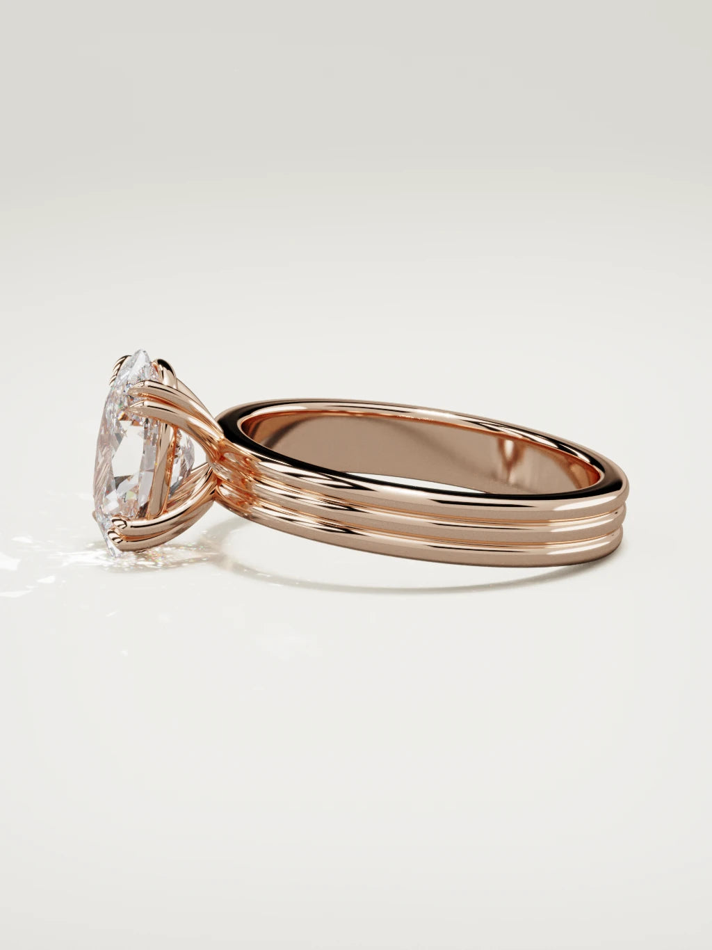 The Lira oval lab-grown diamond solitaire in 14K rose gold, side view